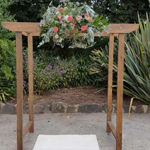 Wooden wedding arch with Native flowers - Ceremonies I Do